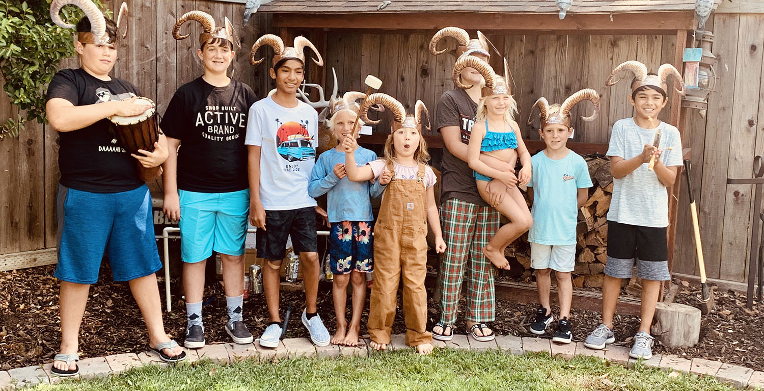 Group of students wearing paper horns after using the WSF SHEEP Kit learning box. Group of students wearing paper horns after using the WSF SHEEP Kit learning box.